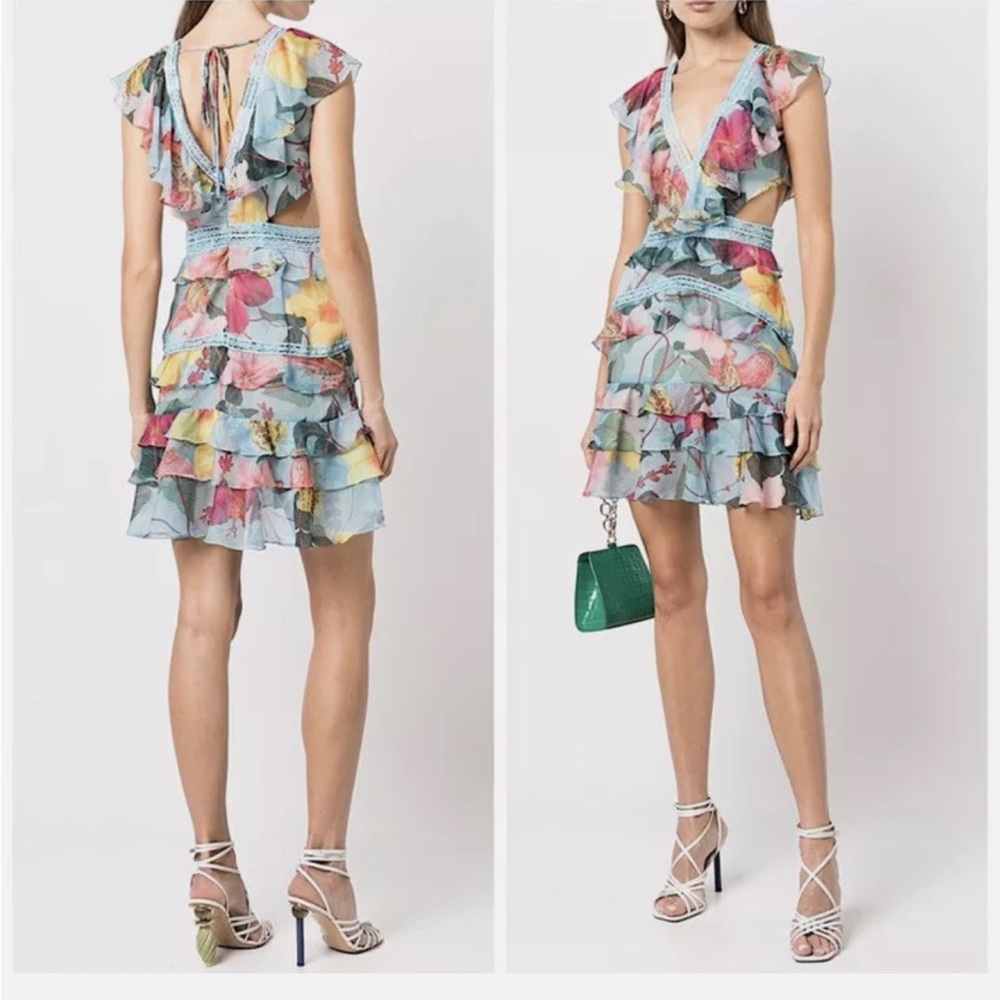 Patbo Blue hibiscus dress with cutouts. Size 10.